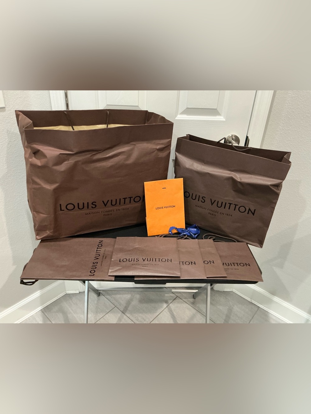 Louis Vuitton shopping gift bags lot assorted sizes and ribbon for one